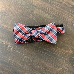 Men’s adjustable red and blue bow tie.